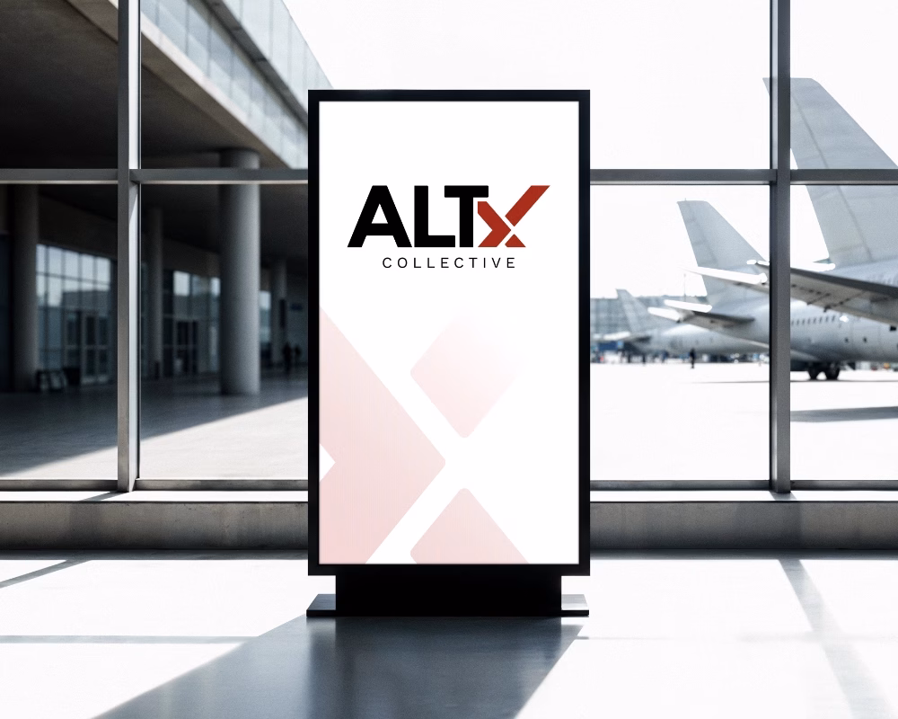ALTx Collective branding displayed on premium airport advertising board