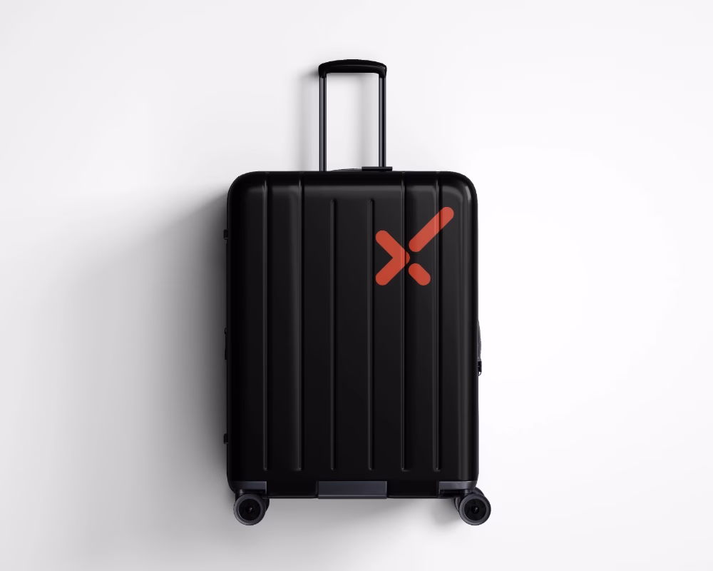 ALTx Collective logo concept applied to black travel suitcase